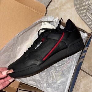 Adidas Black and Red Sneakers Sleek Design - Continental